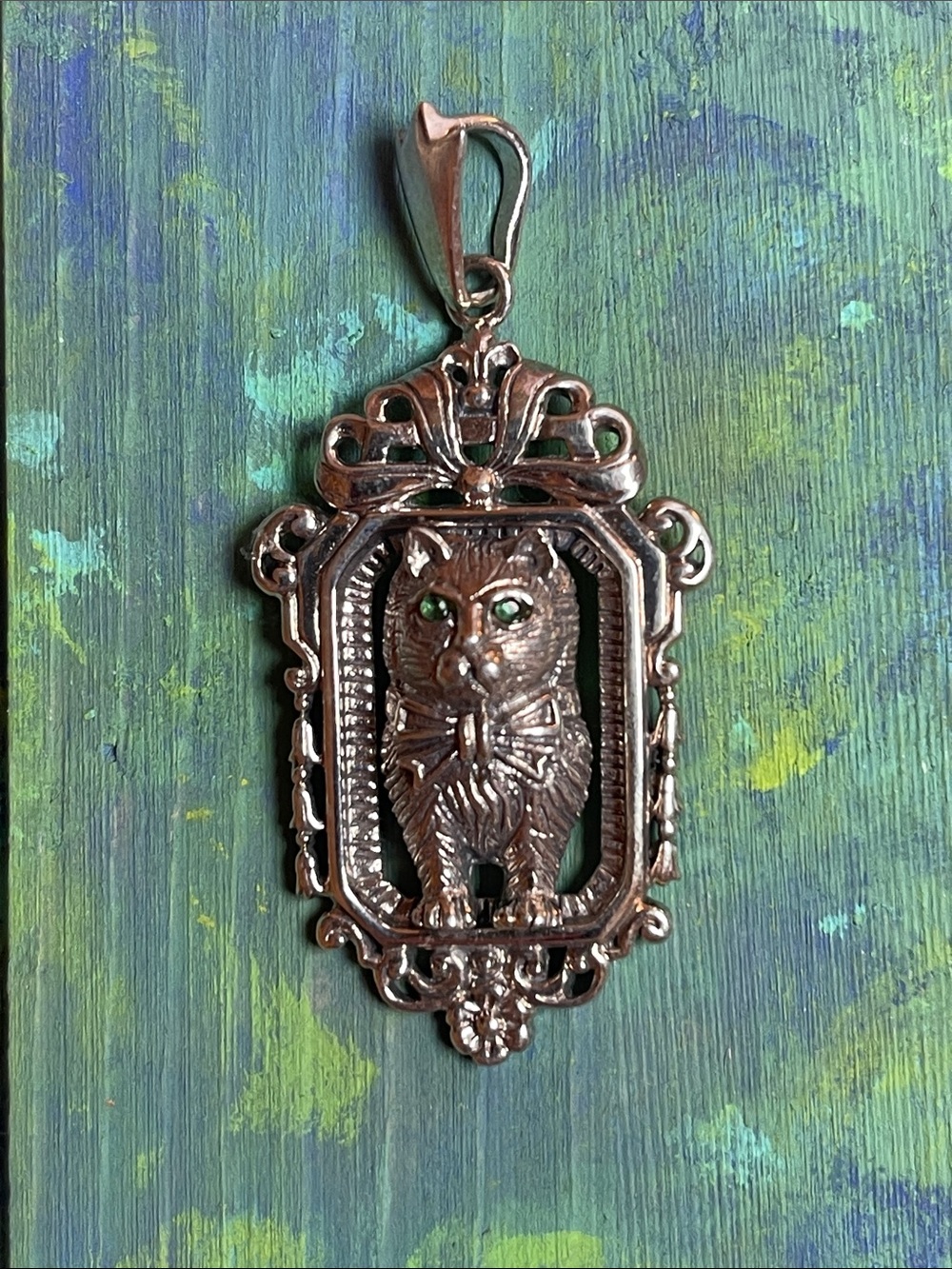 Sterling silver Cat Pendant with green gemstone eyes 925